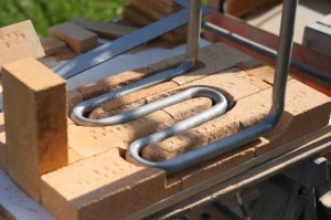 stainless steel hot water pipes carved into replaceable firebox liner